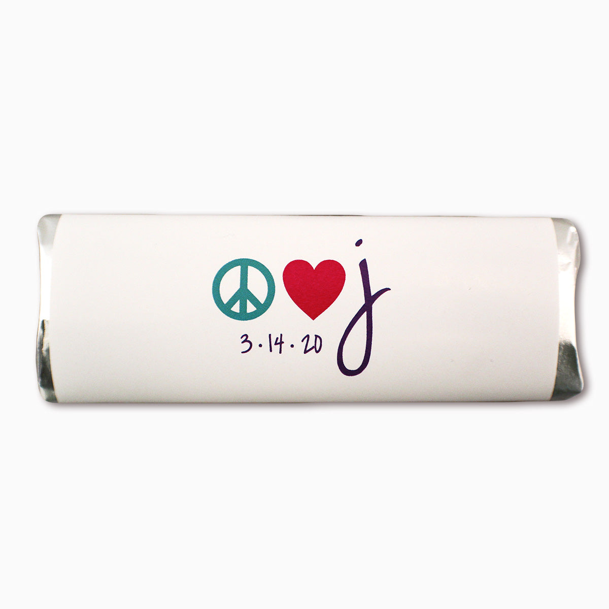Chocolate Bar with white wrapped that has a peace sign, a heart, and the letter "J". A small date for March 14, 2020 is underneath.