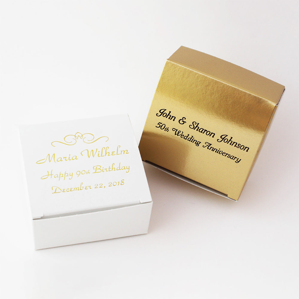 Two small boxes, for 4-piece truffles, engraved with names and dates.